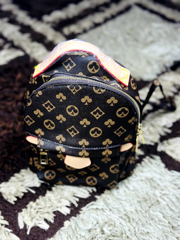 Salgha Brown Monogram Patterned Mini Backpack