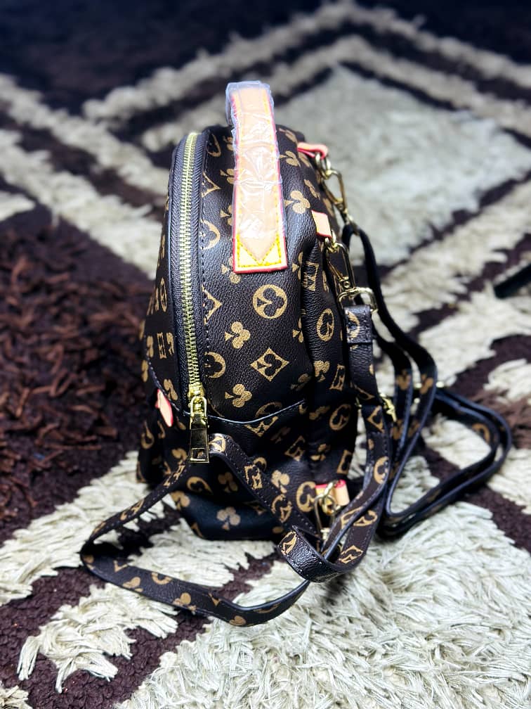 Salgha Brown Monogram Patterned Mini Backpack