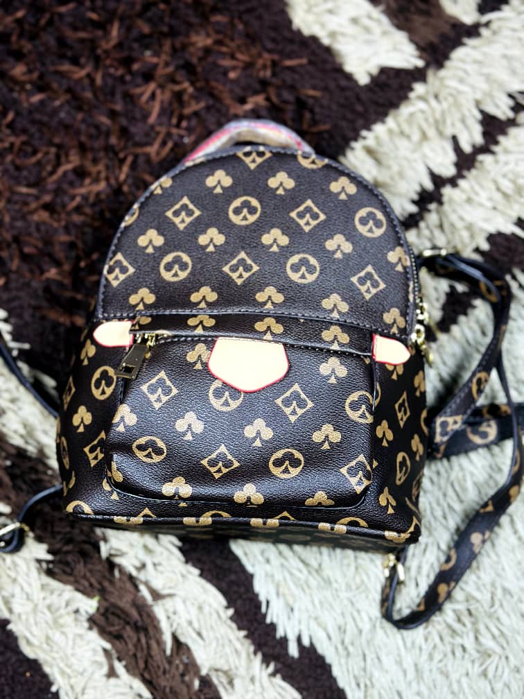 Salgha Brown Monogram Patterned Mini Backpack